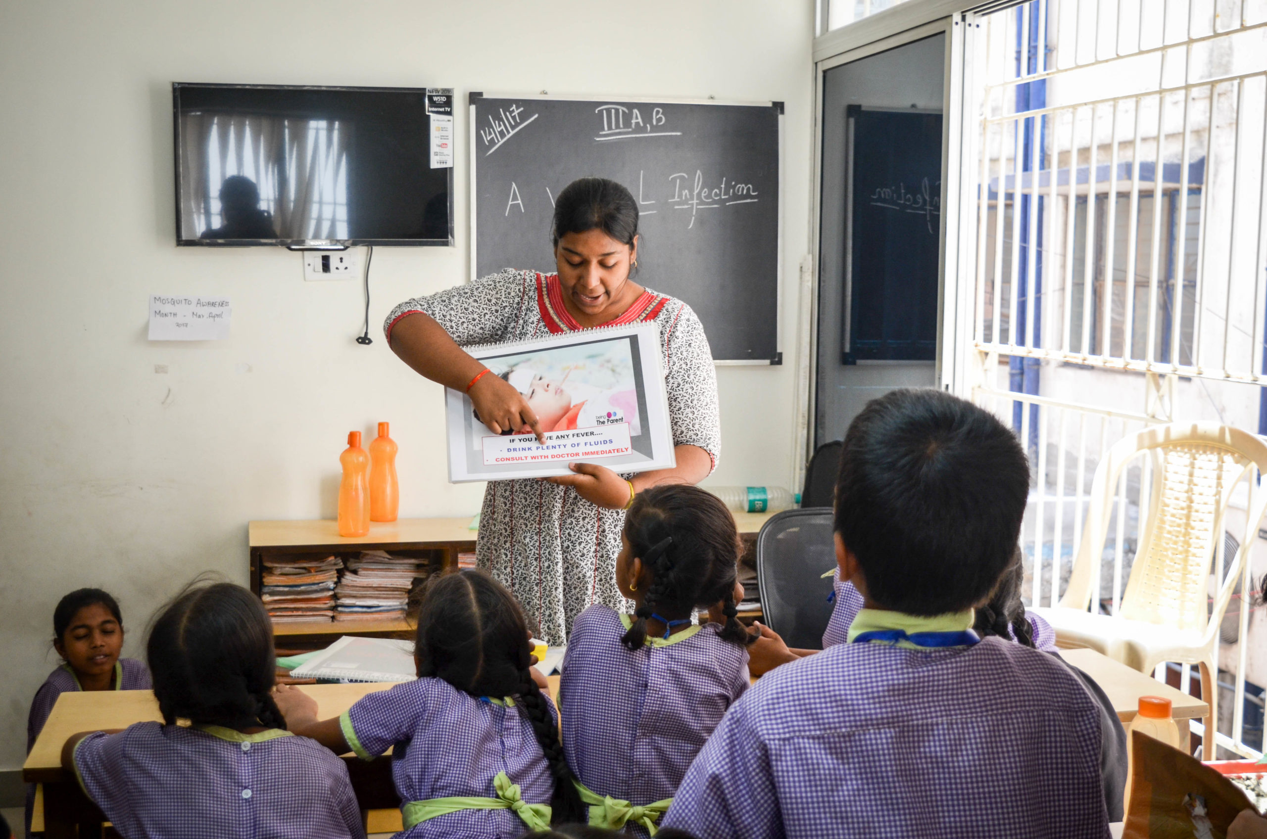 Teacher speaking to classroom of Indian children at EkTara Middle School