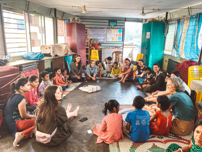 Volunteers tourism in India, volunteers playing games with shelter kids